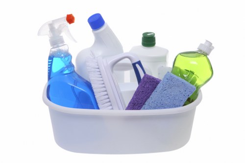 Sanitized workspace with cleaning supplies and organized desks