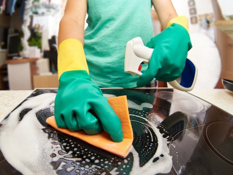 Cleaning baseboards and surfaces in a vacant home